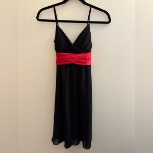 Elegant Black Dress with Red Accent
